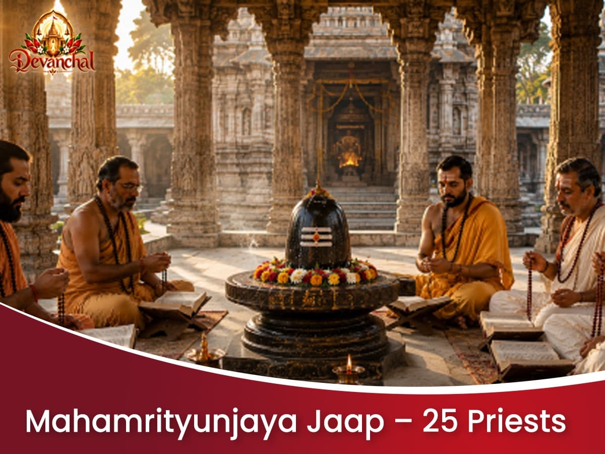 Priests conducting a pooja around a sacred fire in a temple